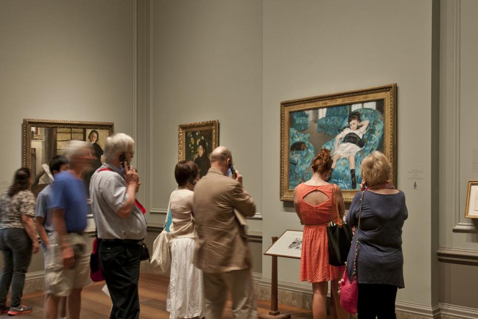 Visitors explore the 2014 Degas/Cassatt exhibition
