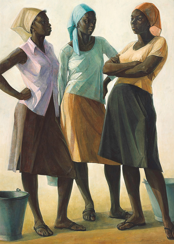 Three women stand talking to each other. The two on the left have their hand on their hip. The one on the right has her arms crossed