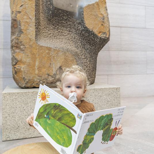 Visitors enjoy Storytime in the National Gallery's East Building.